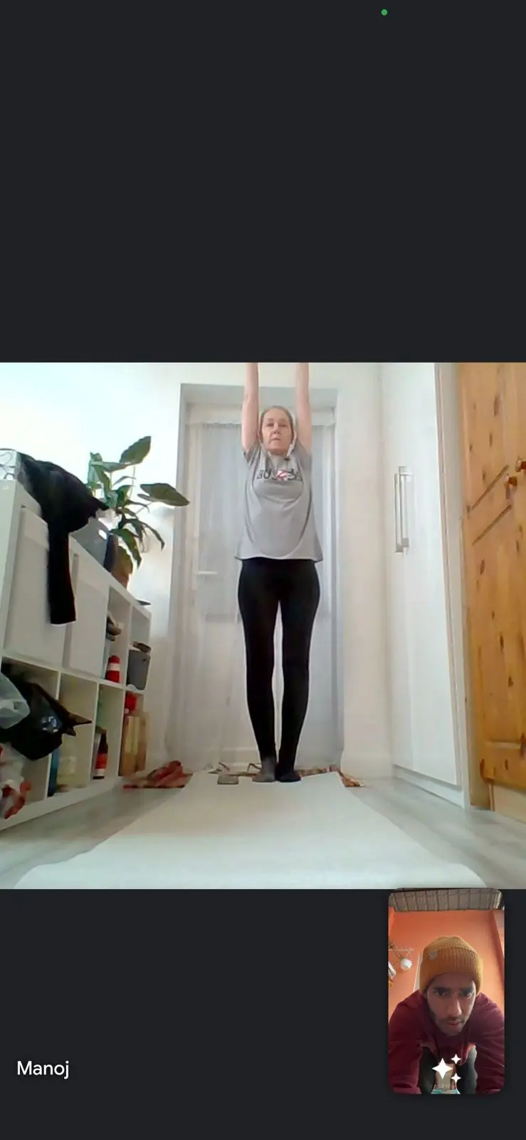 Online yoga coaching session screenshot with posture guidance